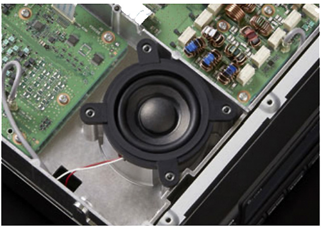 Internal speaker, baffled by die-cast chassis.